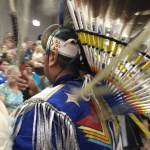 Dancer at Crowded Market Stage