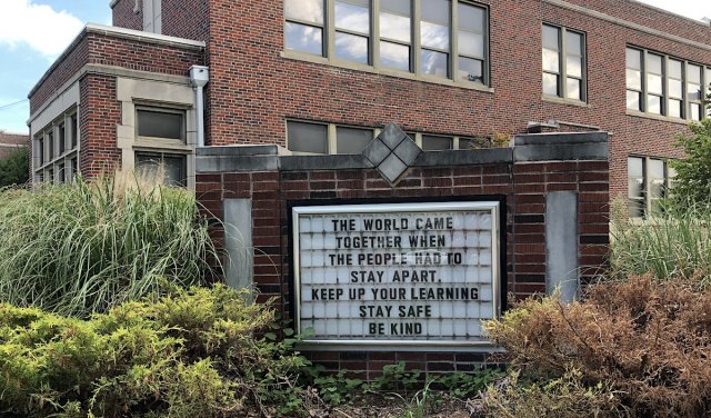 Wilson marquee reopen schools