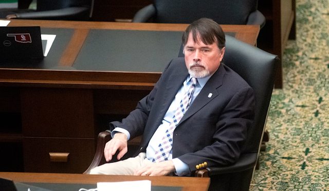 John Waldron resign